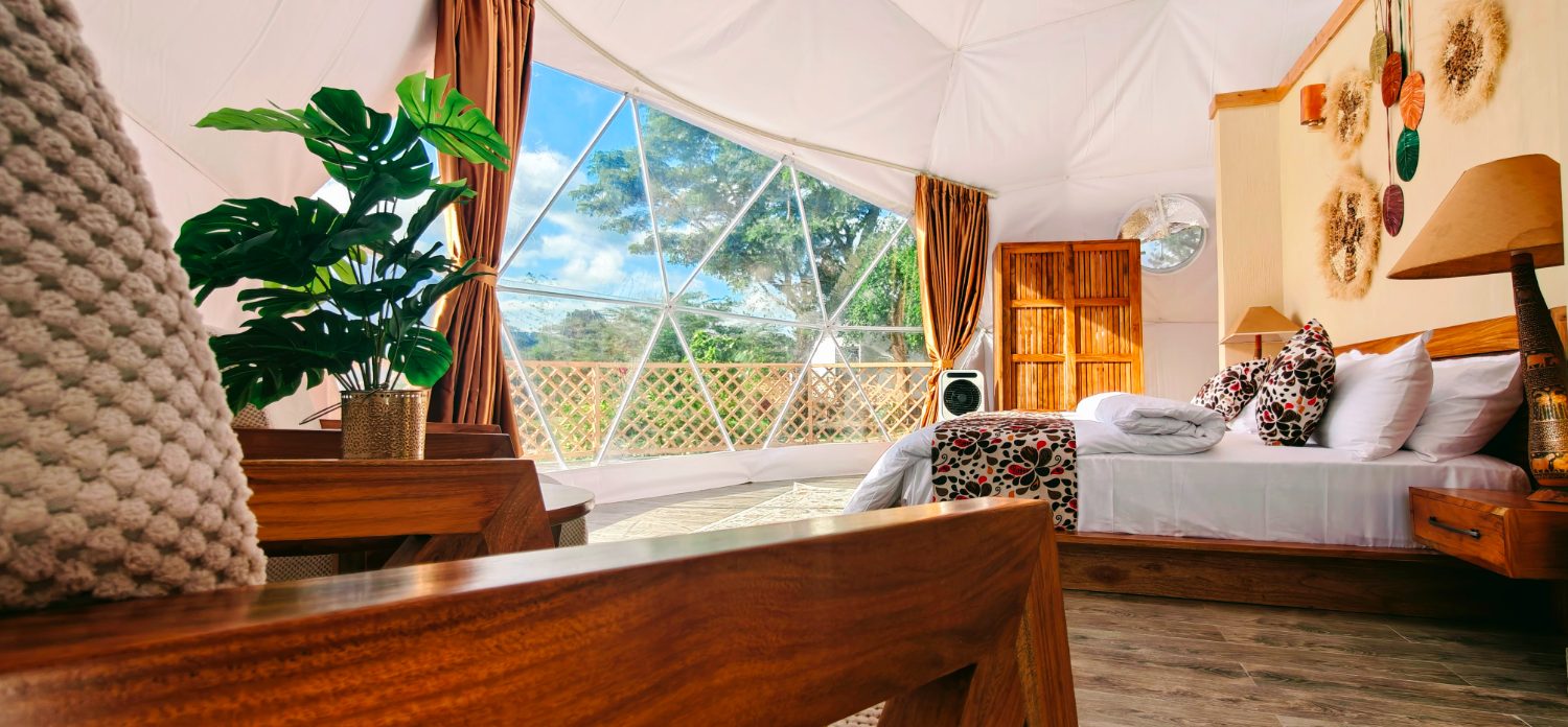 Dome bedroom looking out to the mountain through the glass