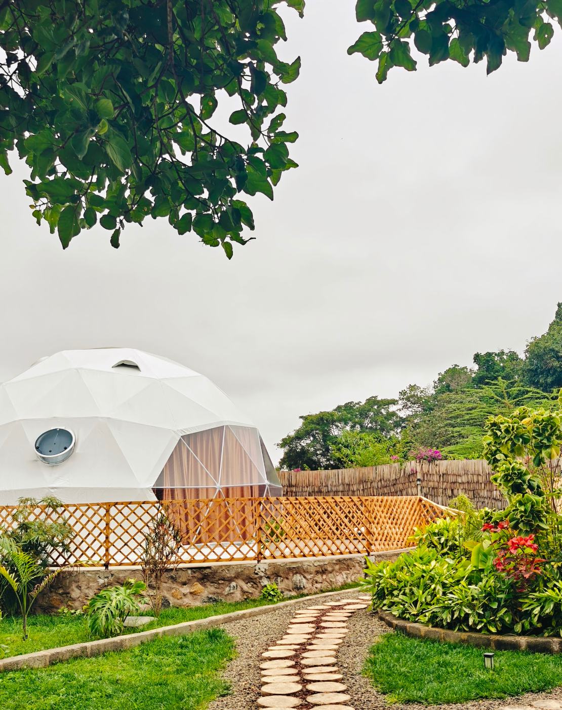 A stone path through the garden to the domes
